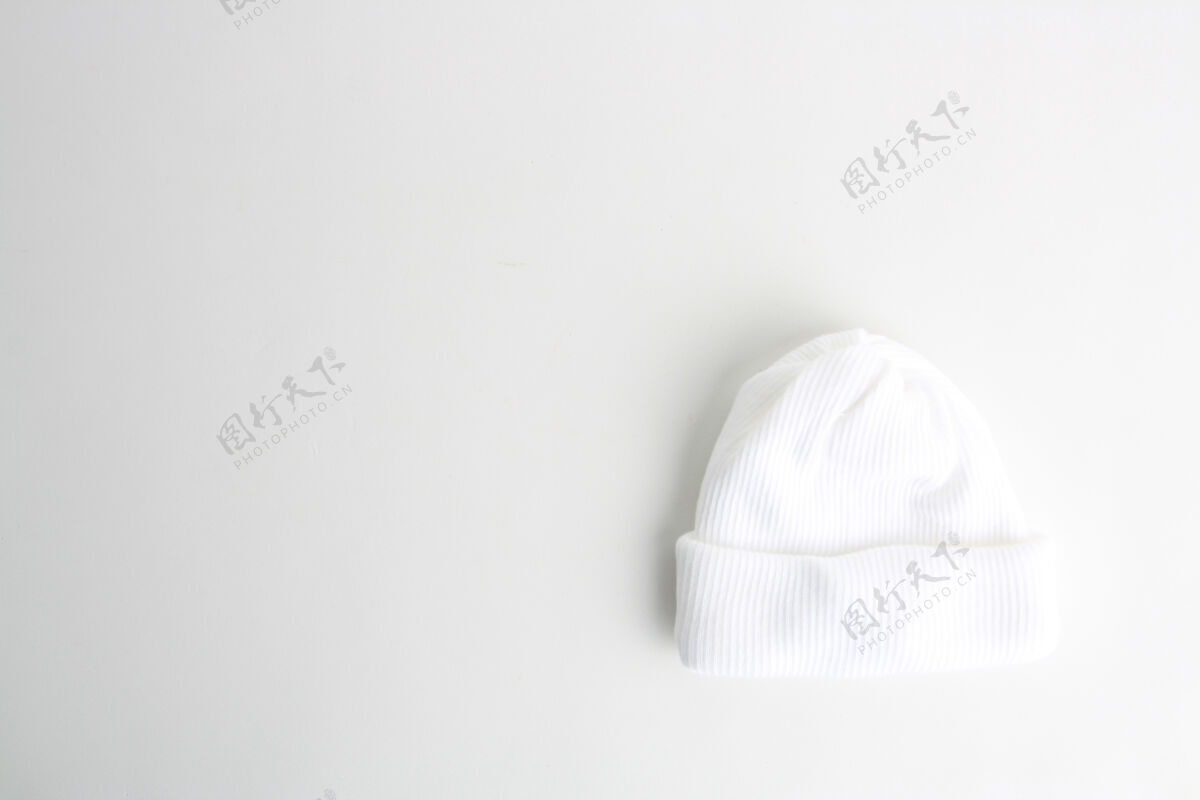 针织白色羊毛婴儿帽顶视图衣服羊毛羊毛