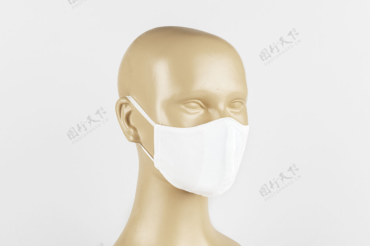医疗保健人体模型上的白色织物面罩头部防护病毒