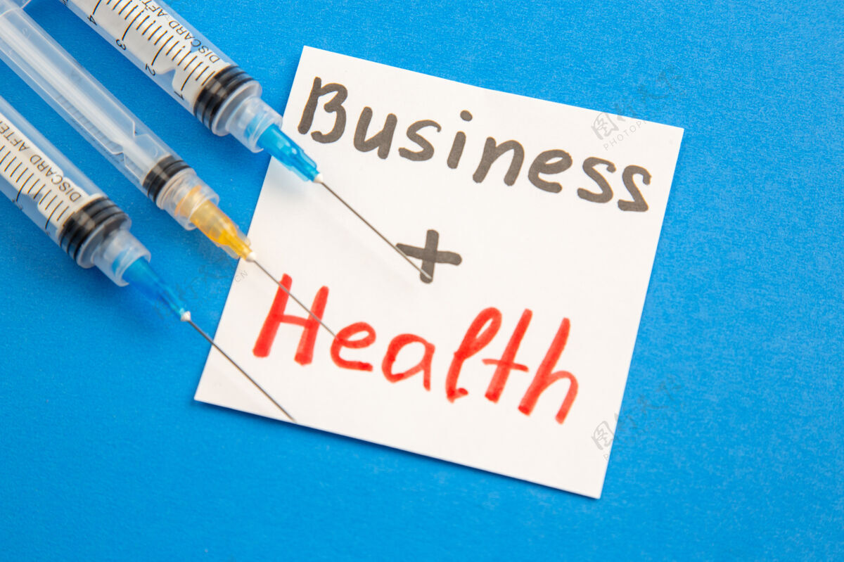 健康前视图业务健康与注射蓝色背景纸张蓝色笔