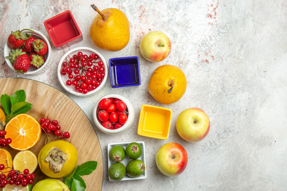 浆果顶视图水果组成不同的水果在白色的桌子上可食用水果柑橘健康