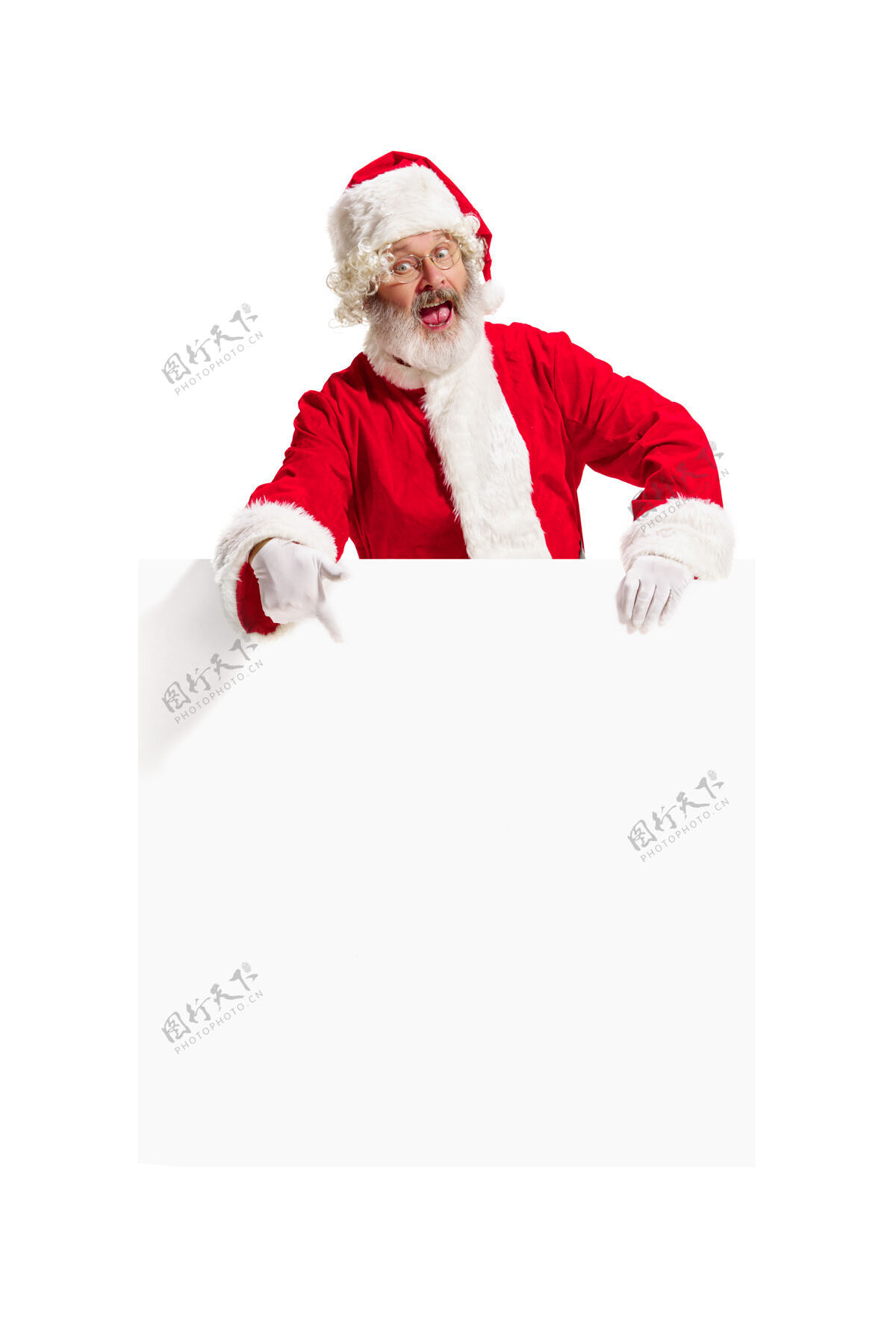 空白惊喜的圣诞老人指着空白广告圣诞节节日男人