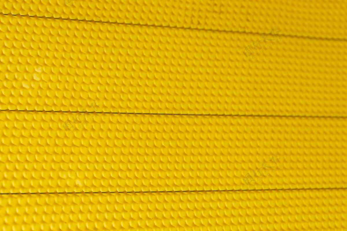 蜂蜜黄色蜂窝状纹理背景纹理宏
